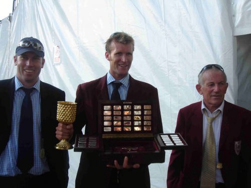 Mahe Drysdale is present with the Henley Diamonds - becoming only the second New Zealander to ever win the trophy, and holds the Pineapple Cup, which he retains for his win. &copy; Mahé Drysdale